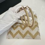 Gold Tone Hoop Earrings with Chevron Pouch Photo 1