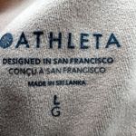 Athleta  Conscious Cut Out Sports Bra High Racerback Powervita Bright Peach L Photo 2