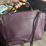Kate Spade  Laurel Way Lilah satchel in a burgundy or mulberry color. Photo 1