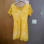 Dress Barn 2 dresses  and another yellow and green size medium and size 8 Photo 5