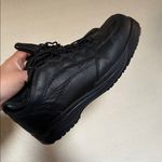 Works by Red wing black leather Worx by Red Wing safety toe athletic shoes. 9.5 Photo 1