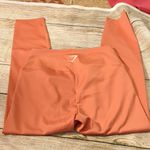 Gymshark  orange crop leggings size medium Photo 4