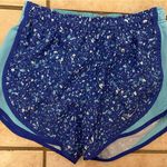 Nike Womens  Dri fit light blue and royal athletic running shorts Photo 0