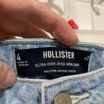 Hollister  Light Wash Distressed Ripped Raw Hem Ultra High Mom Denim Shorts Photo 1
