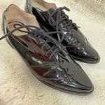 Louise et Cie  Shiny Black Lace-Up Flats Photo 1