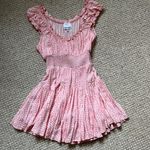 Isabelle's Cabinet Isabelles’s cabinet Naomi Pink Polka Dot Mini Romper Photo 0