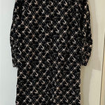 Elegant Black and Cream Geometric Swim Coverup Photo 0