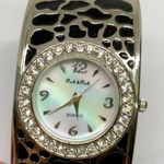 Peck & Peck  women’s watch Quartz analog 31mm colorful pearl dial 7” running Photo 1