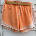 Nike  Women's Orange Running Shorts Photo 0