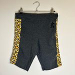 Disney  Animal Kingdom Gray Shorts with Yellow Leopard Print Size Medium Photo 0
