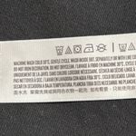 Disney  spirit jersey sz small black long sleeve white raised lettering pullover Photo 4