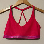 Under Armour  Women's Bright Pink Sports Bra Photo 0