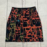 Silence + Noise  orange and black patterned short skirt Photo 0