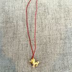Small Gold plated Dragon Pendant Necklace with Red Cord Photo 5