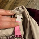 Victoria's Secret Nwot purple Victoria’s Secret ruched one piece bathing suit Medium bow spring Photo 4