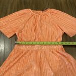 MINKPINK Revolve  Livia Plisse short sleeve Flowy Orange Pleated Romper small Photo 1