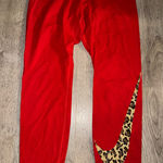 Nike Rare Red  Cheetah Swoosh Pants - Y2K Photo 0