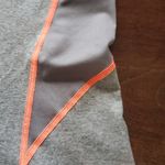 The North Face women's tank size small gray with neon orange details dri fit Photo 3