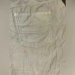 American Eagle High-Waisted Distressed Denim‎ Shorts in Cream White with Raw Hem Detail F4 Photo 5