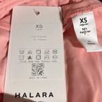 Halara  Skirt High Waisted Breezeful Tie Side 2in1 Side Pocket Mini Peach XS NWT Photo 9