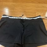 Tropical Escape  women’s black swim shorts size 10. Photo 4