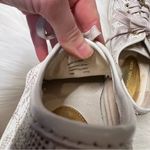 Michael Kors  Logo Off white/cream tennis shoes with gold hardware Photo 8