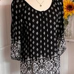Angie Black & White 3/4 Sleeve Casual Top. Photo 1