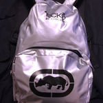 ✨ New Marc Ecko Silver Metallic Backpack | Streetwear Logo Bag Photo 0