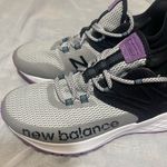 New Balance Black and White Sneakers with Purple Accents Photo 4