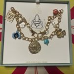 Gold tone and Blue Charm Bracelet with Delicate Charms for your handbag Photo 0