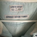 Life is Good  Women's Light Blue Hoodie with Daisy Embroidery Photo 1