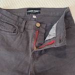 Black Skinny Jeans with Red Zipper Accents Size 27 Photo 1