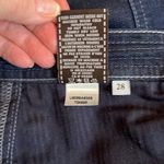7 For All Mankind ādarkādenimāskirt sizeā28āfrontāand back pockets back vent EUC Photo 6