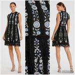 Mac Duggal  Black Sleeveless High Neck Embroidered Mini Dress Photo 1