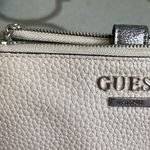 Guess  zipper pocket phone case rose gold wristlet Photo 1