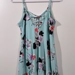Light Blue mini Dress with Floral Accents and Cross Back Details Size Medium Photo 1