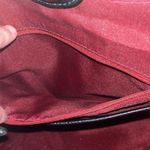 Franco Sarto  black leather bag. Red interior. Used with small minimal tears. Photo 6