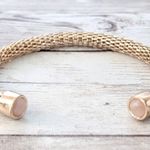 Gold Tone Cuff Bracelet with Light Pink Gem Ends Photo 4