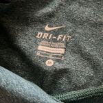 Nike Dri-fit leggings in medium dark green.  GUC. Photo 1