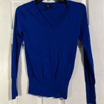 Mossimo Supply Co  long sleeve Sweater is a size Small P. Photo 0