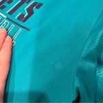 Nba Charlotte Hornets  women’s athletic short sleeve size medium Photo 3