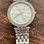 Michael Kors  silver color faux diamond watch fits a small wrist 5 inches laying Photo 0