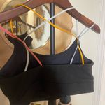 Peloton  Women’s Black Logo Sports Bra with Colorful Criss Cross Straps Active Photo 4