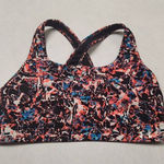 Under Armour  Sports Bra Women’s Sz L Mid Crossback Splatter Printed Photo 0