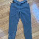 Athleta Salutation Stash Wrap Tight leggings cutouts pockets Hematite Grey Sz LP Photo 4