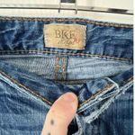 BKE  Medium Wash Mid-Rise Boot Cut Denim Jeans With Some Wear On Hems Photo 1