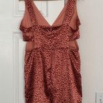 Sweet Storm cheetah print mini dress with cutouts. Photo 11