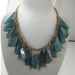Style and Grace
Mid Century Modern Gold Tone Necklace With Tons of Lucite Drops Blue Photo 4