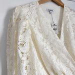 EXPRESS NWT Cream Lace Wrap Top with Bow Tie Side Size M Photo 5