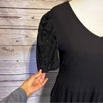 Ava James  Black Midi Dress Size Medium | Short Puff Sleeve Eyelet Detail Photo 1